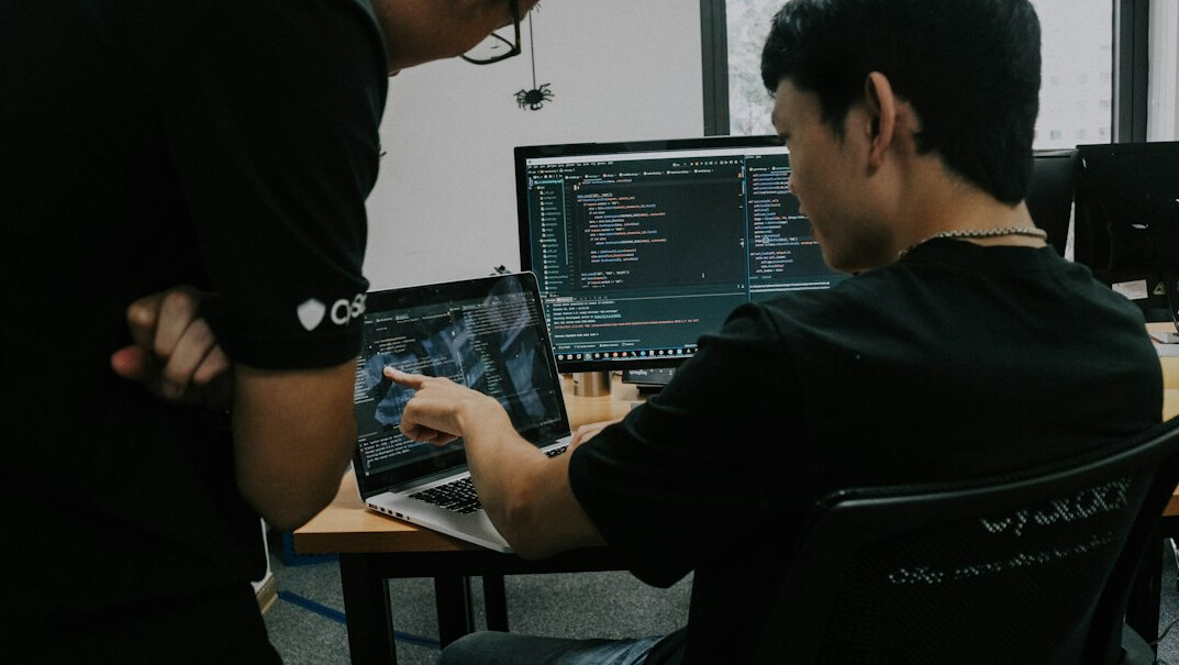 programmers coding custom software